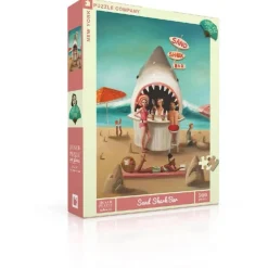 Puzzle 500 pièces : Barre de requins des sables - New York Puzzle Company